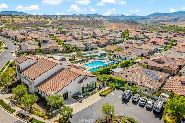 drone / aerial view featuring a mountain view