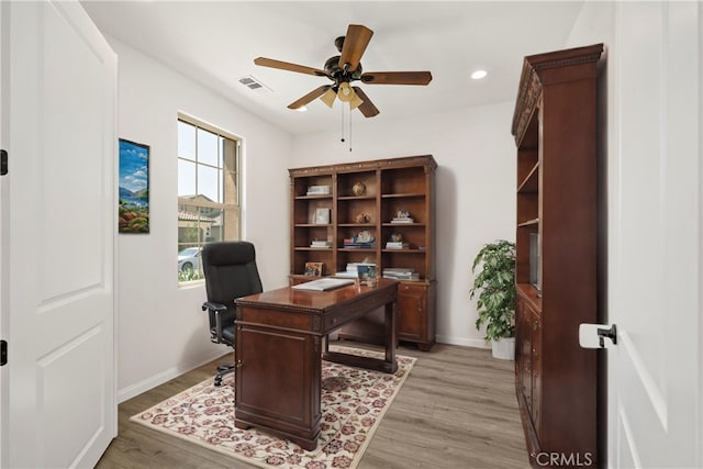 office area featuring ceiling fan and light wood-type flooring