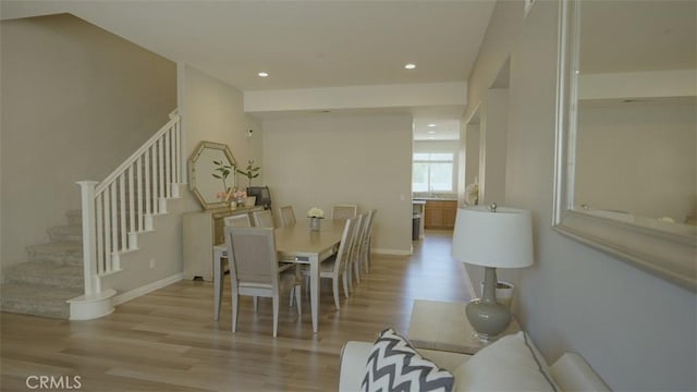 dining room with light hardwood / wood-style floors