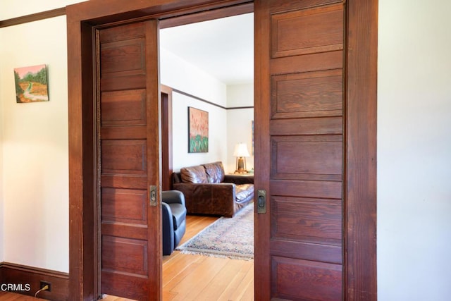 foyer entrance with hardwood / wood-style flooring