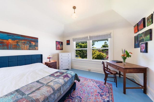 bedroom featuring lofted ceiling