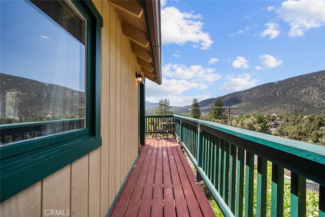 balcony featuring a mountain view