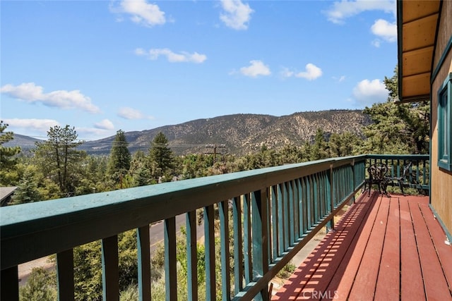 deck with a mountain view