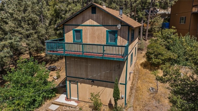 exterior space featuring a balcony