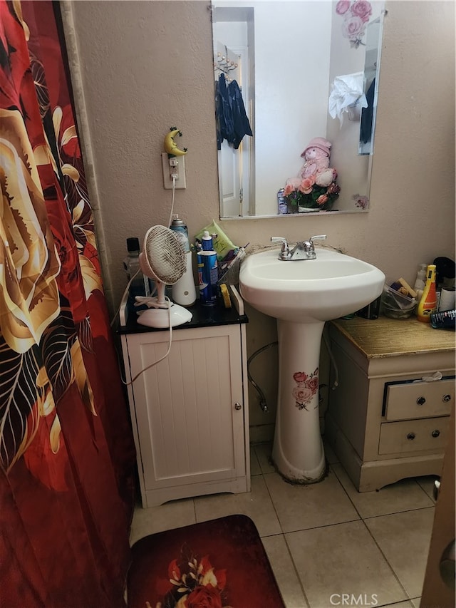 bathroom featuring tile patterned flooring