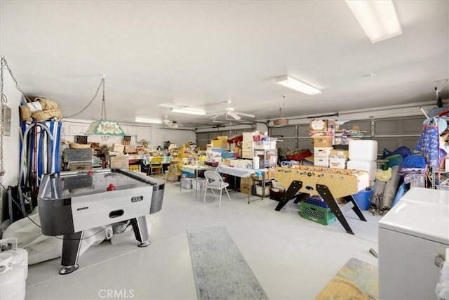 interior space with ceiling fan and washing machine and dryer