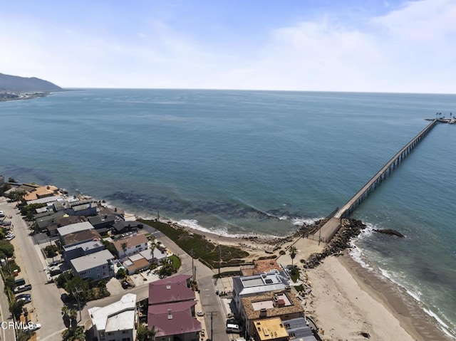 drone / aerial view with a view of the beach and a water view