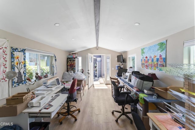 office space featuring vaulted ceiling with beams and light wood-type flooring