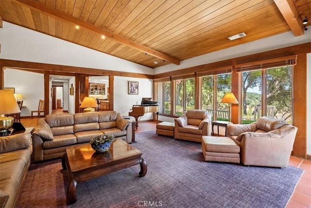 living room with wooden ceiling, tile patterned flooring, and a wealth of natural light