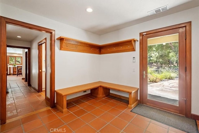 mudroom featuring recessed lighting, visible vents, baseboards, and tile patterned floors