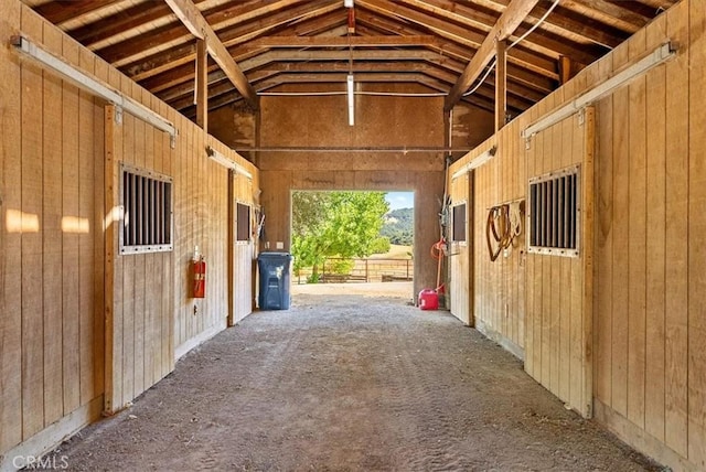 view of horse barn featuring electric panel