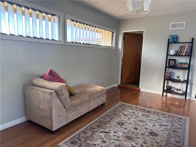 living area with dark wood-type flooring