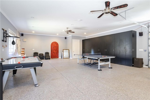 recreation room featuring light speckled floor, ornamental molding, a ceiling fan, and recessed lighting