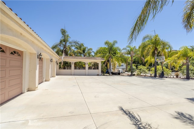 exterior space with a garage