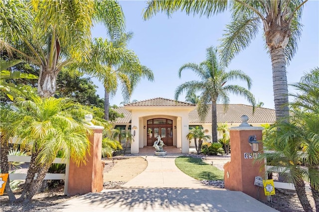 6516 Affirmed Pl, Moorpark, CA 93021 - mediterranean / spanish house with french doors, stucco siding, and a tiled roof