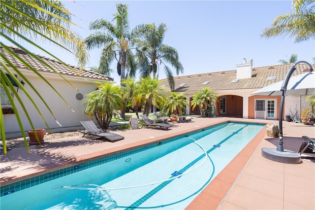 pool with a patio area