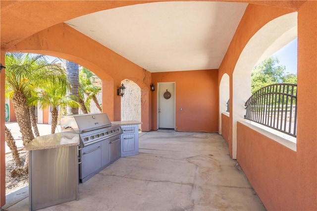 view of patio / terrace with exterior kitchen and area for grilling