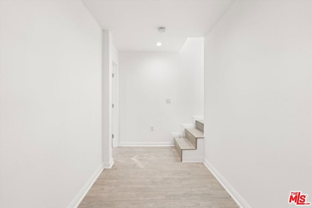 hallway featuring light wood-type flooring