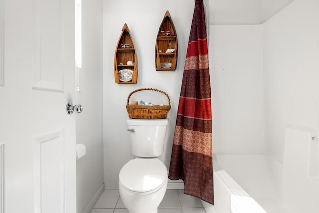 bathroom with tile patterned flooring and toilet