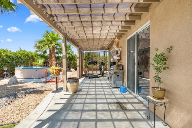 view of patio featuring a pergola and a hot tub