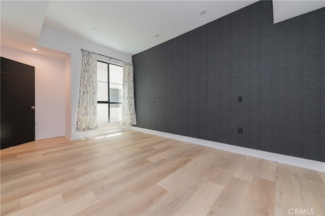 empty room featuring light hardwood / wood-style flooring