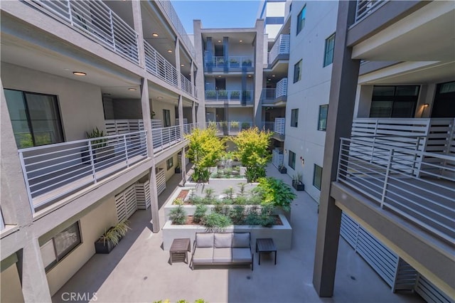 view of community with an outdoor living space