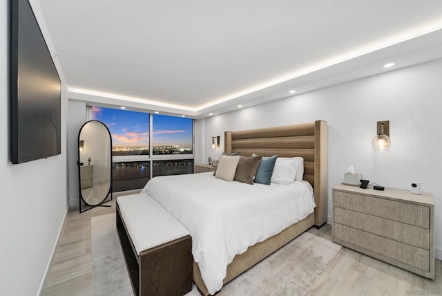 bedroom featuring light wood-type flooring