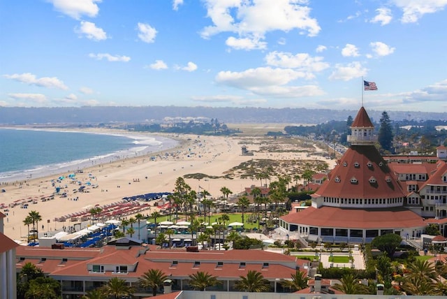 birds eye view of property featuring a view of the beach and a water view