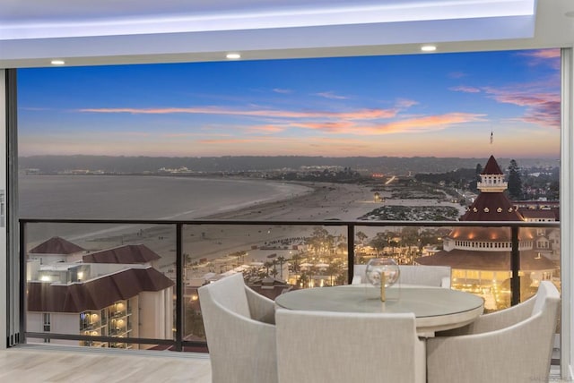 view of balcony at dusk