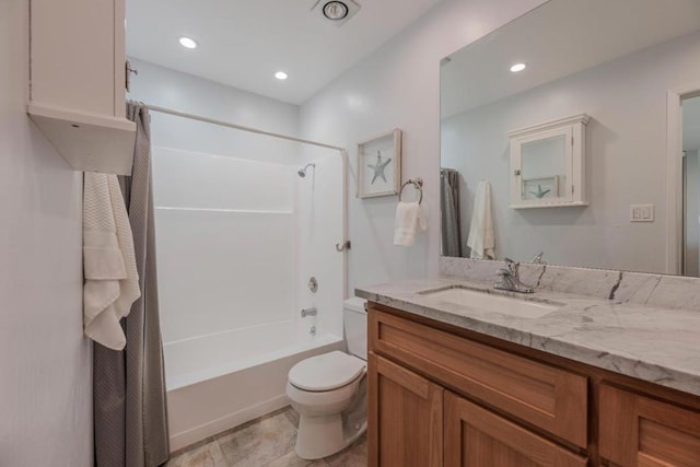 full bathroom with vanity, toilet, and washtub / shower combination