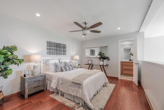 bedroom featuring dark hardwood / wood-style floors and ceiling fan