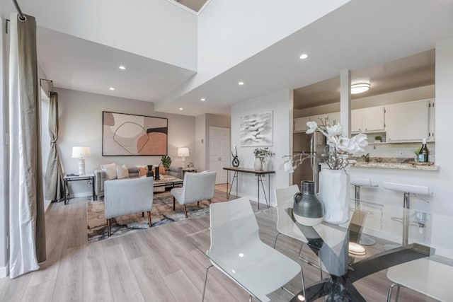 dining area with light hardwood / wood-style flooring