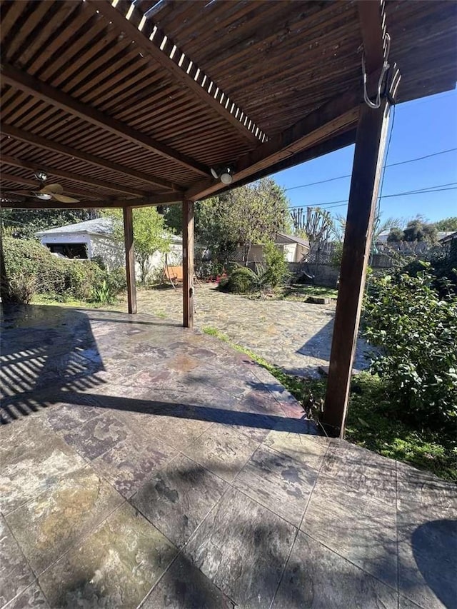 view of patio with fence