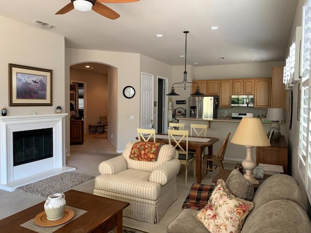 living room with ceiling fan