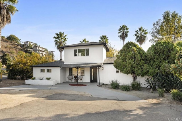 view of front of home featuring stucco siding