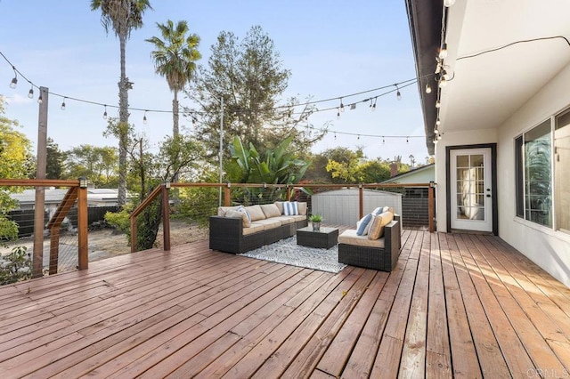 wooden deck with outdoor lounge area