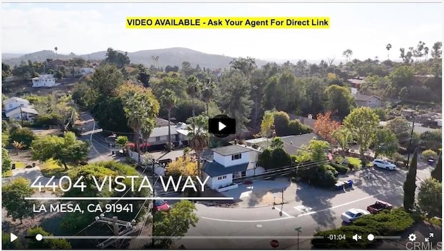 drone / aerial view featuring a mountain view