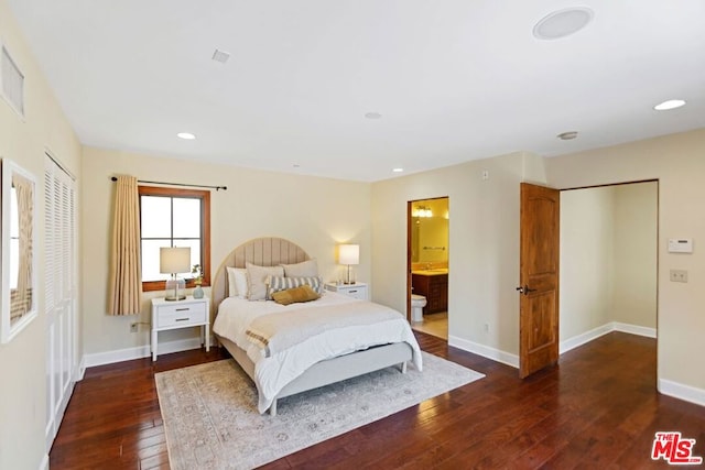 bedroom with dark hardwood / wood-style flooring, connected bathroom, and a closet