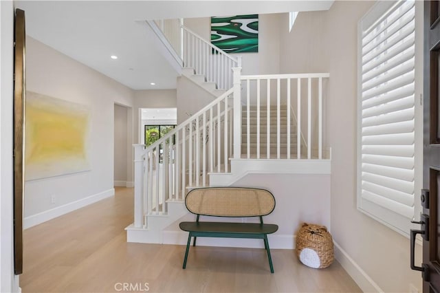 stairway with wood-type flooring