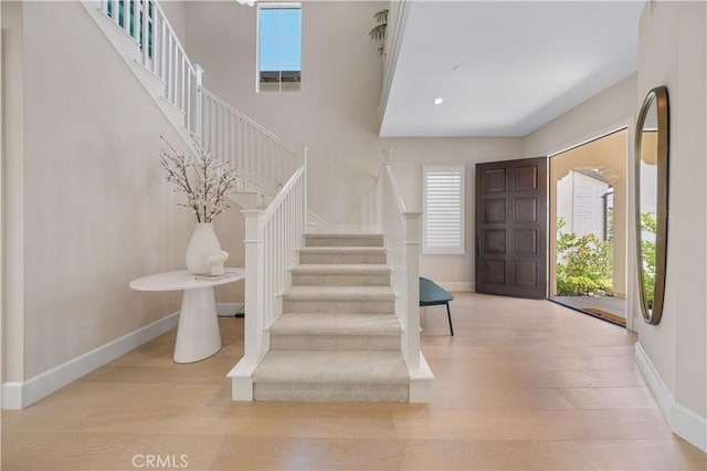 entryway with light hardwood / wood-style floors