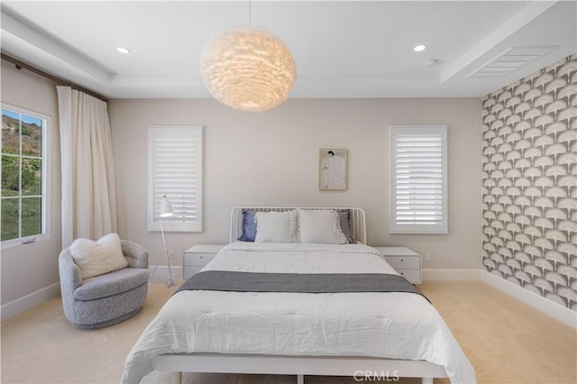 bedroom featuring light colored carpet