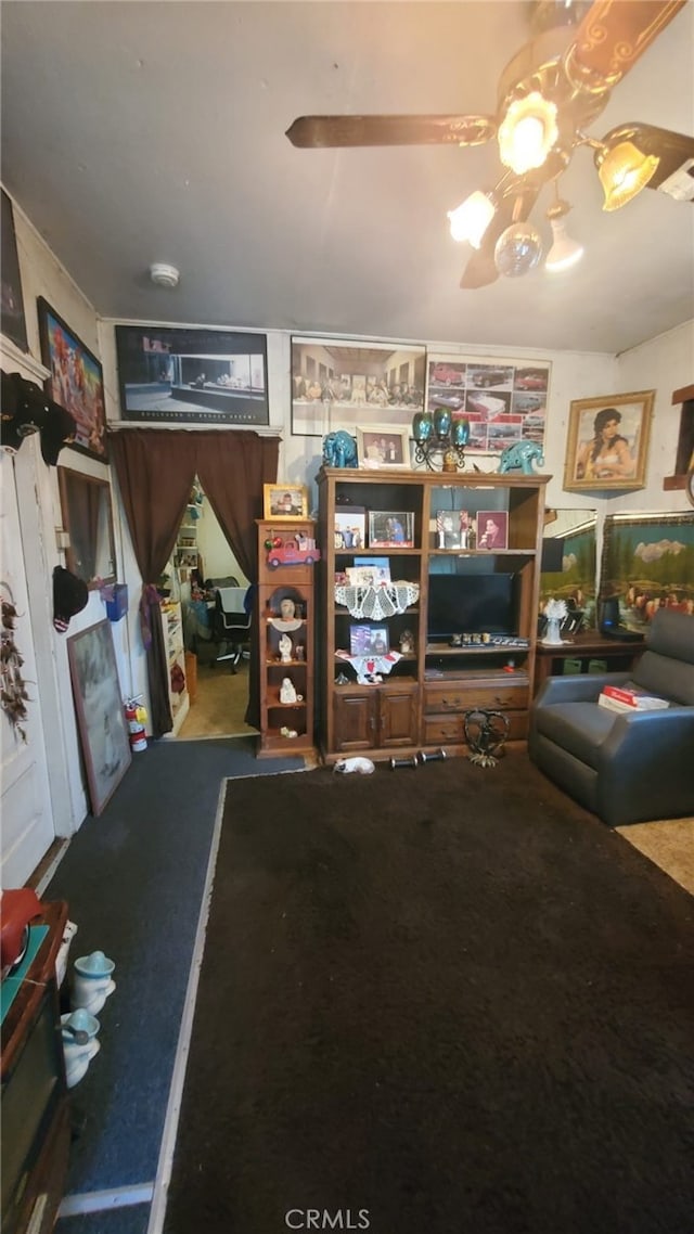 interior space featuring ceiling fan