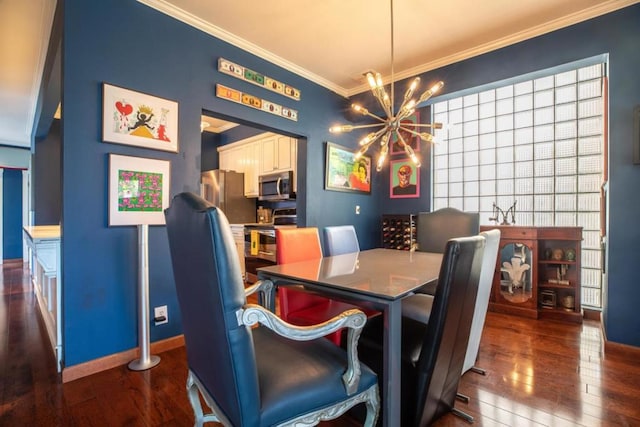 dining area with dark hardwood / wood-style floors, ornamental molding, and an inviting chandelier