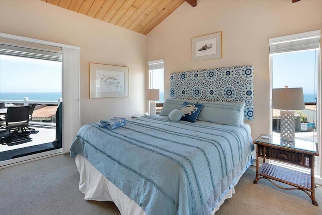 carpeted bedroom with vaulted ceiling with beams, access to exterior, wooden ceiling, and a water view