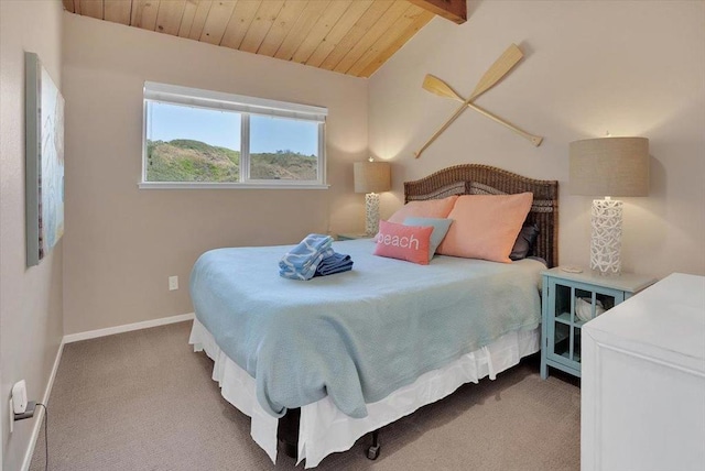 bedroom featuring vaulted ceiling with beams, light colored carpet, and wood ceiling