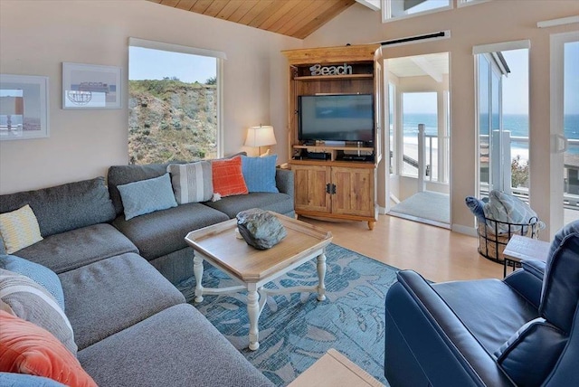 living room featuring lofted ceiling, wood ceiling, and light wood-type flooring