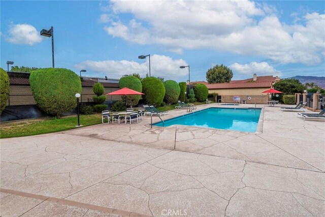 view of pool with a patio area