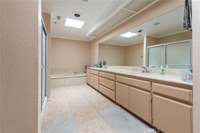 bathroom featuring tile patterned flooring, ornamental molding, separate shower and tub, and vanity