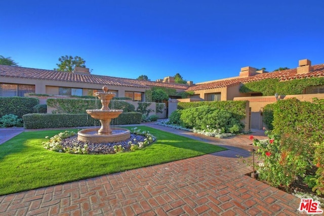 view of front of home with a front yard