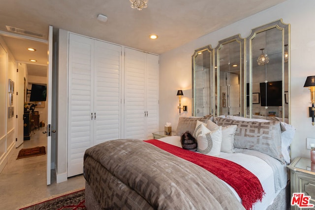 bedroom featuring concrete floors